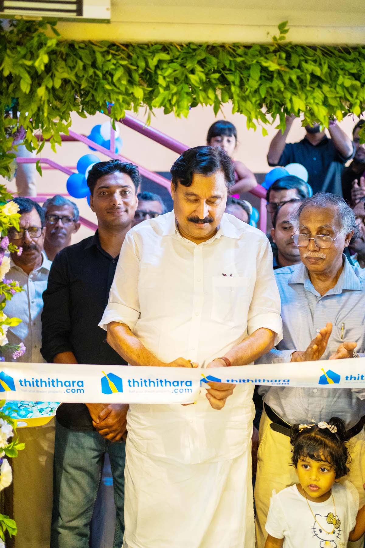 Minister V. Abdurahiman inaugurates Thithithara’s new headquarters as renowned writer P.K. Parakkadavu unveils the logo of Tharabot, the AI-powered WhatsApp chatbot set to transform Kerala’s real estate sector